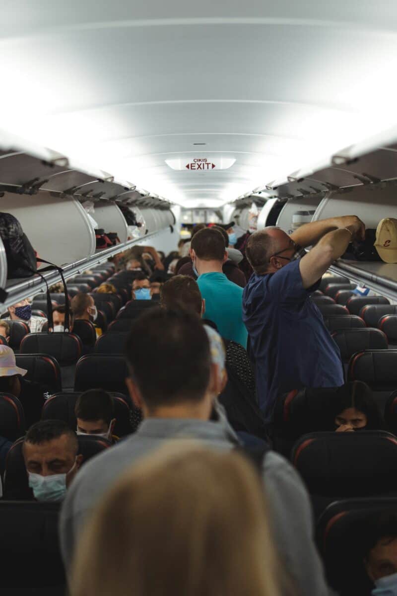 airplane cabin economy passengers”