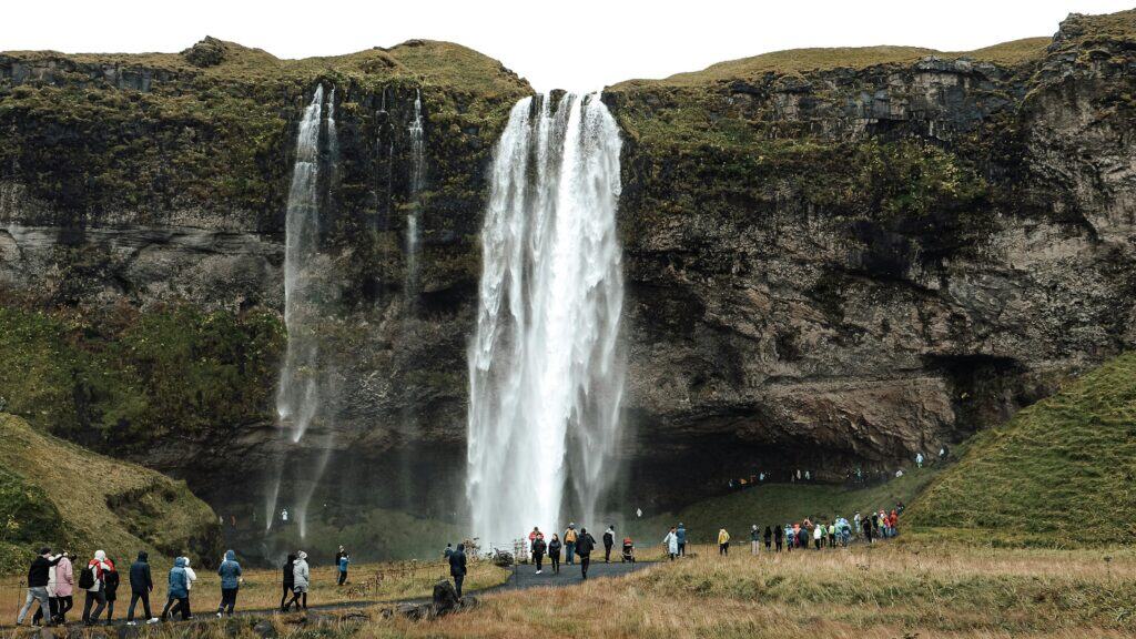 Iceland tourist crowd nature site”