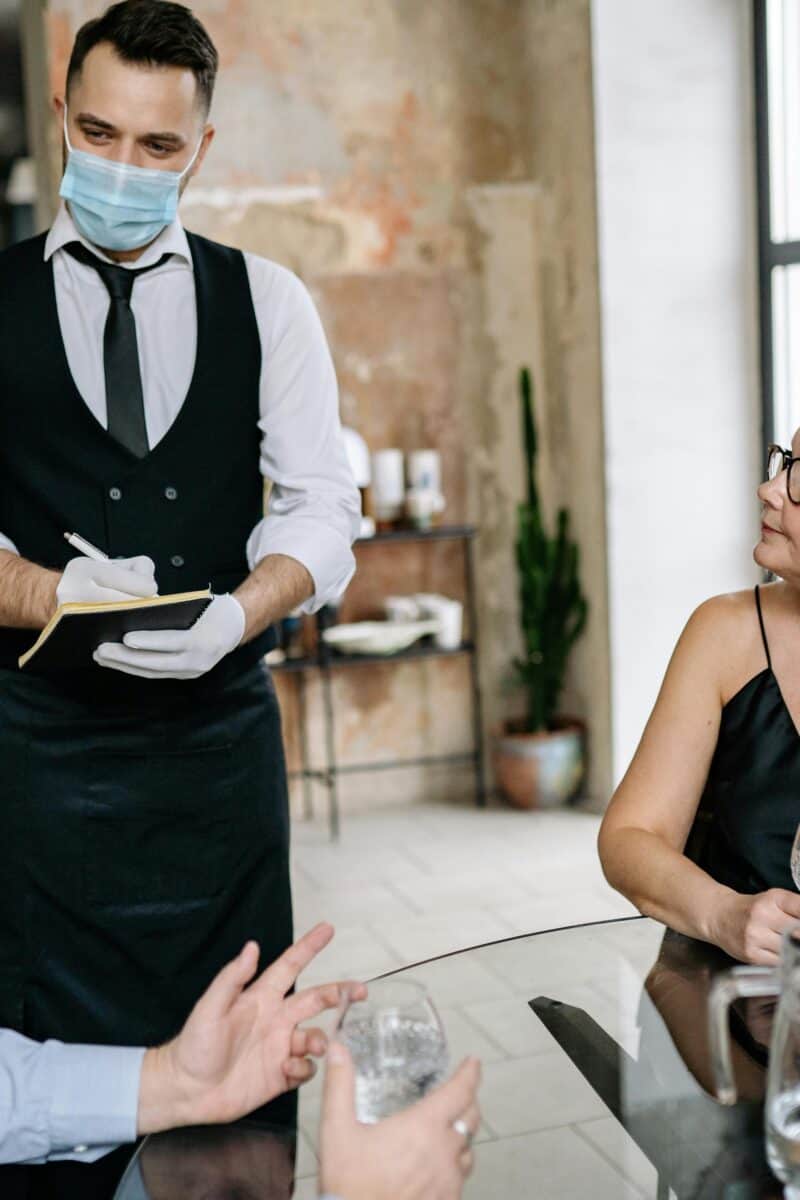 restaurant server taking order