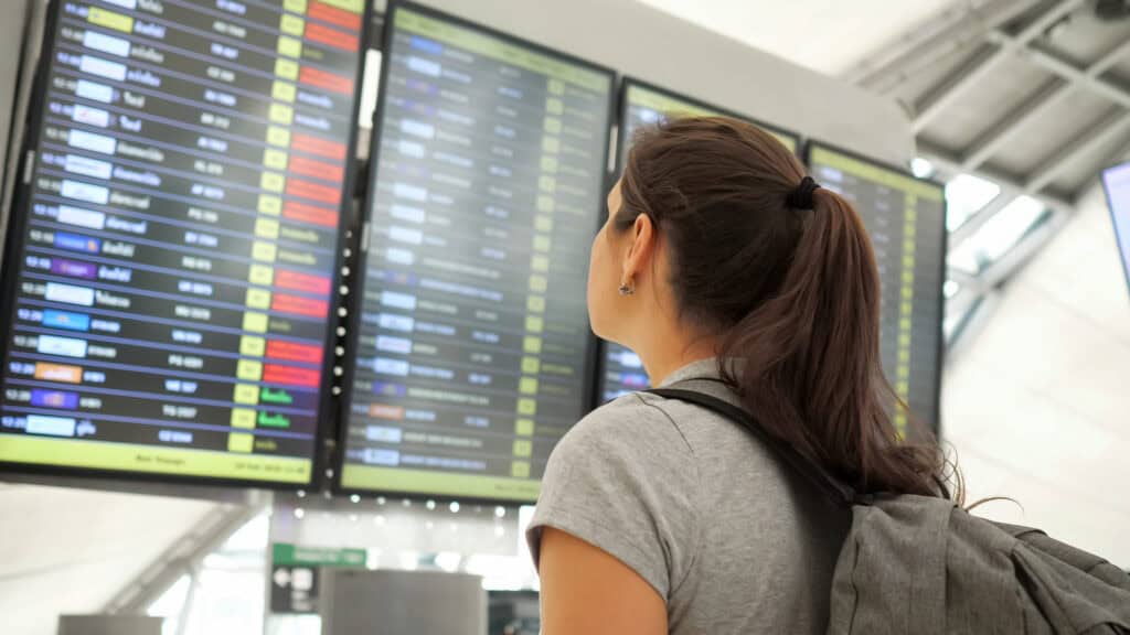 airport departure board cancelled flights red