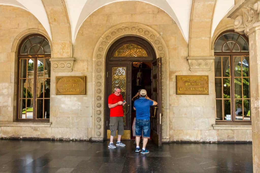 tourist shorts tank top church entrance