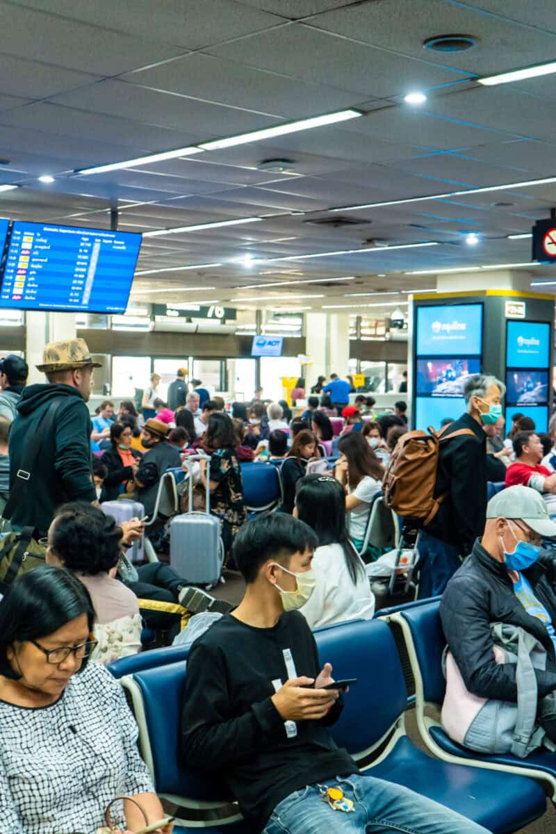 airport cancelled flights crowd terminal chaos