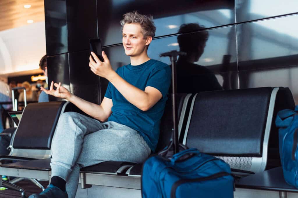 traveler waiting at airport immigration counter