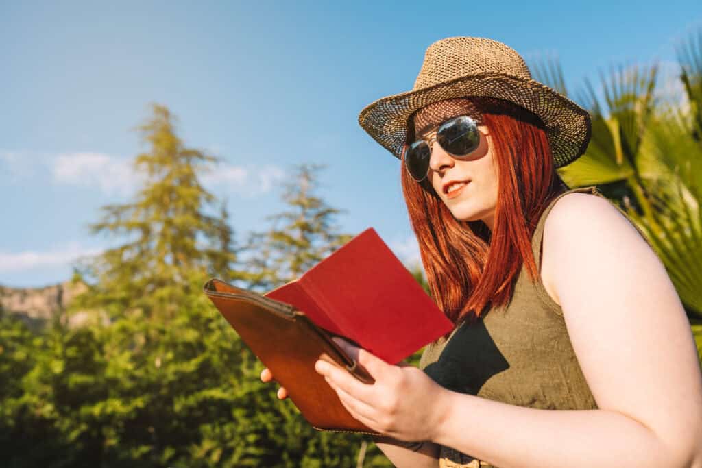 traveler journaling trip planning notebook