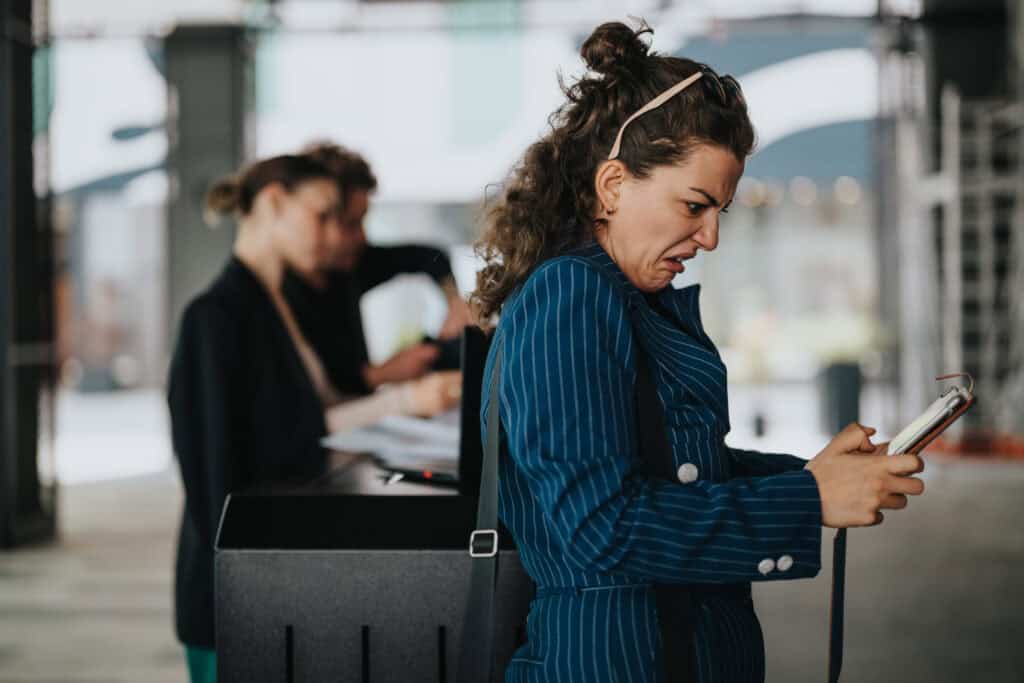 frustrated traveler airport check in desk
