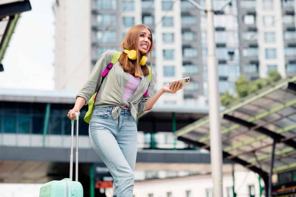 traveler confused transit station foreign city