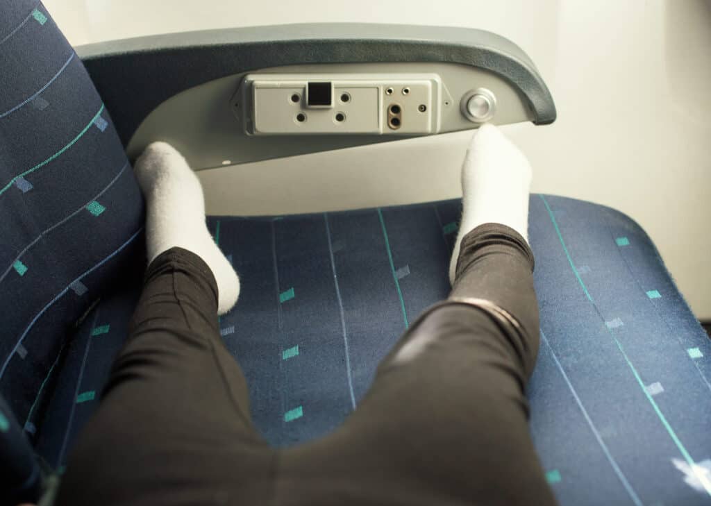 passenger barefoot airplane seat discomfort