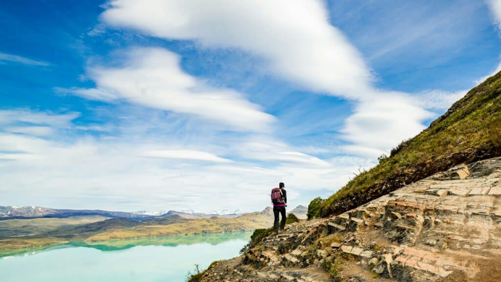 solo hiker remote trail mountains