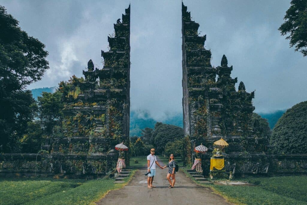 Bali temple entrance tourists walking