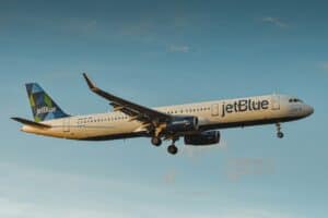 JetBlue airplane wing view sky