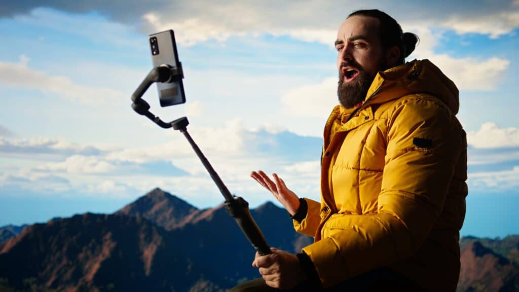 influencer taking photo tripod scenic spot