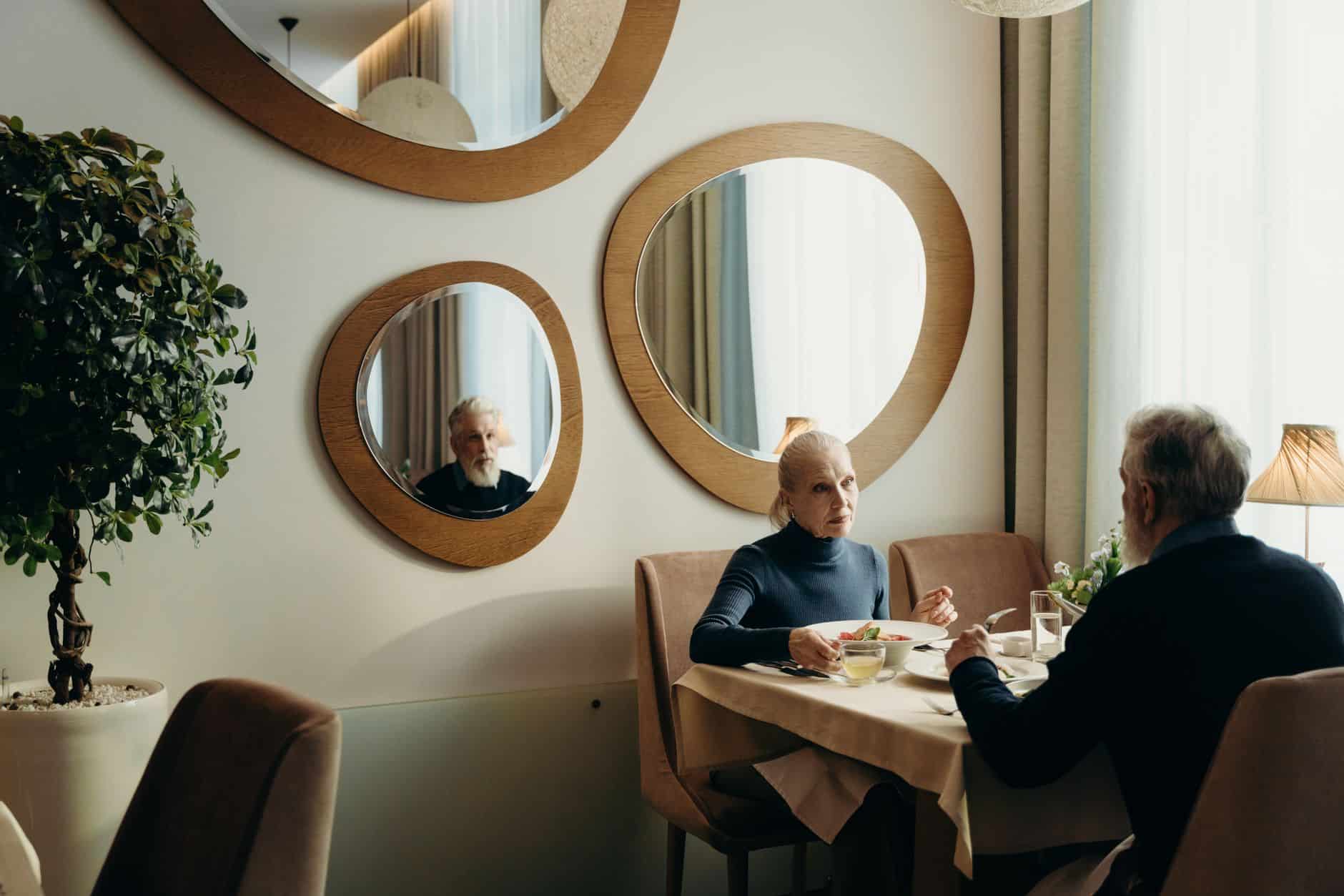 senior couple restaurant abroad