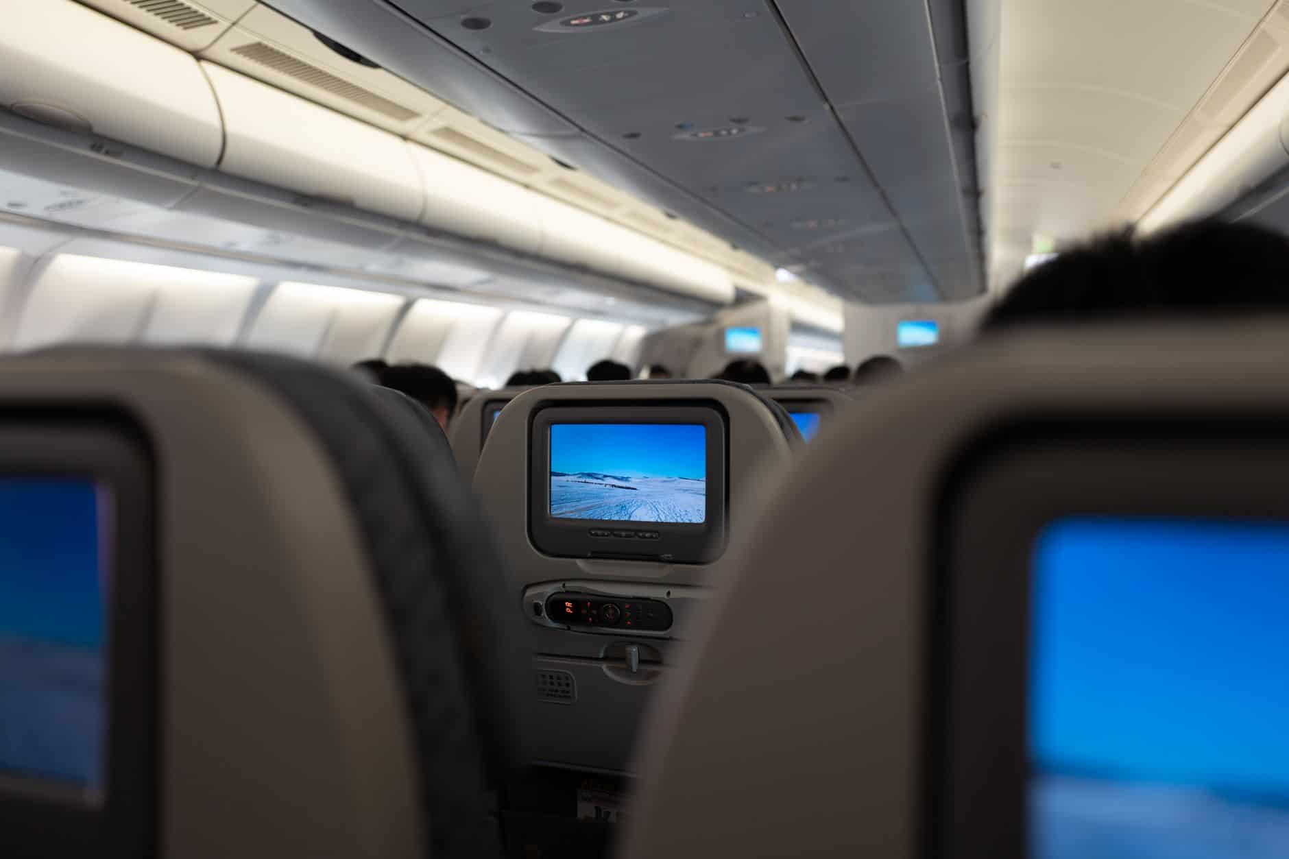 business class flight older traveler