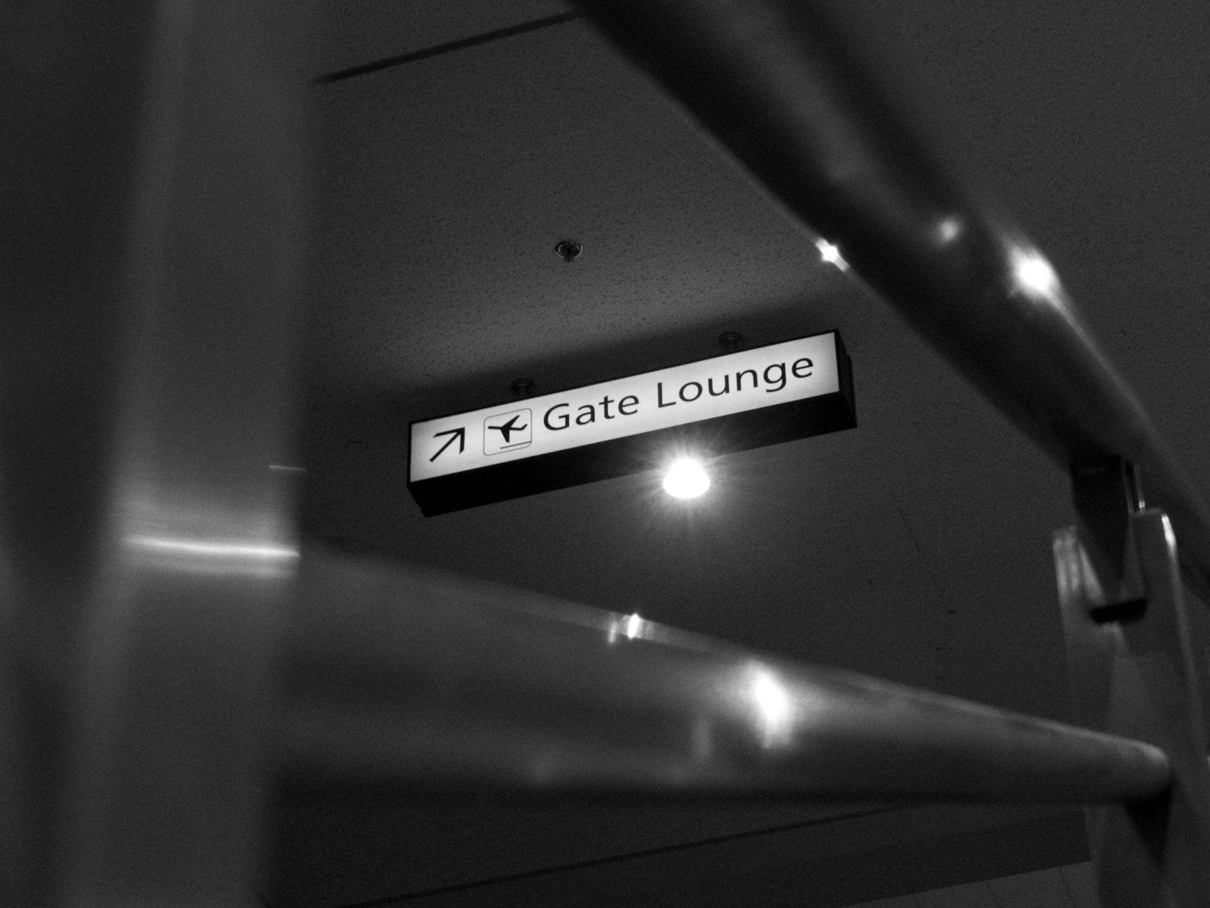 airport lounge entrance sign