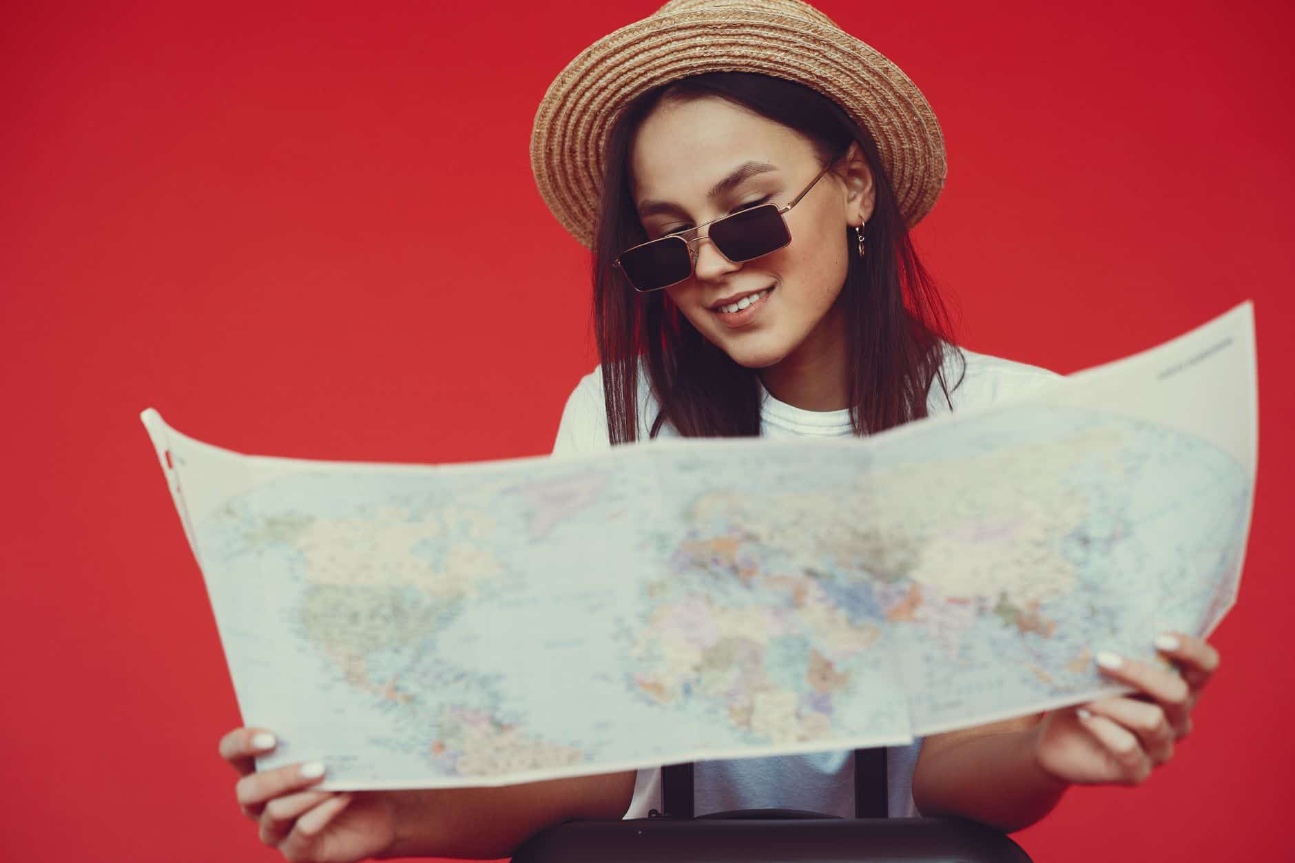 woman reading travel guide