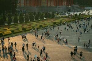 A vibrant scene of people exploring the plaza by the National Concert Hall in Taipei, Taiwan.
