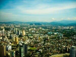 Stunning aerial view of Kuala Lumpur showcasing its vibrant urban skyline and iconic skyscrapers.