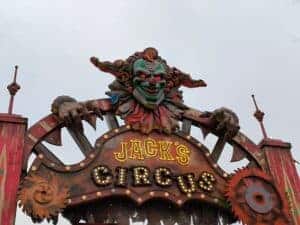 Creepy clown decoration at Jack's Circus entrance, perfect for horror themes.