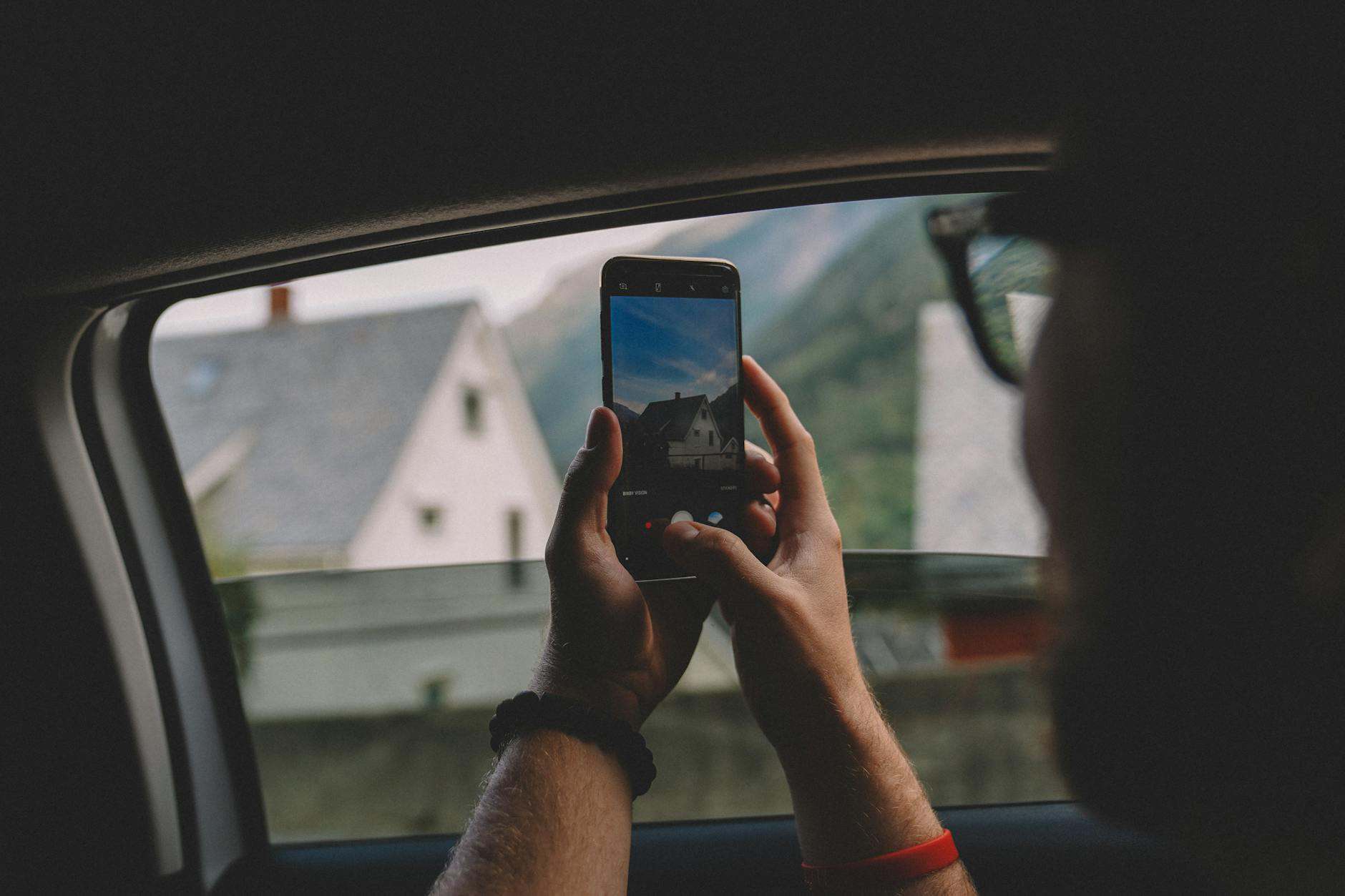 phone taking travel photo