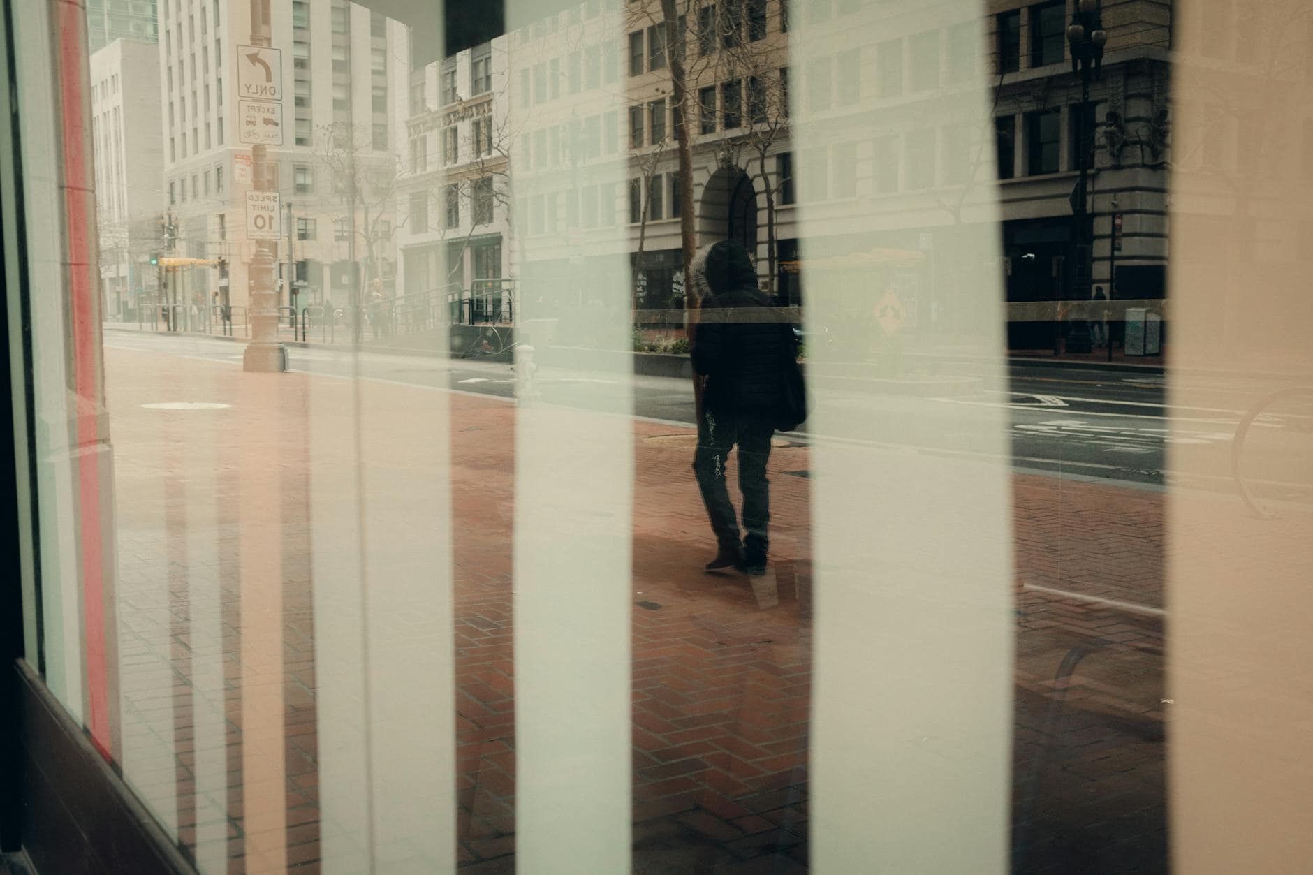 person walking city street