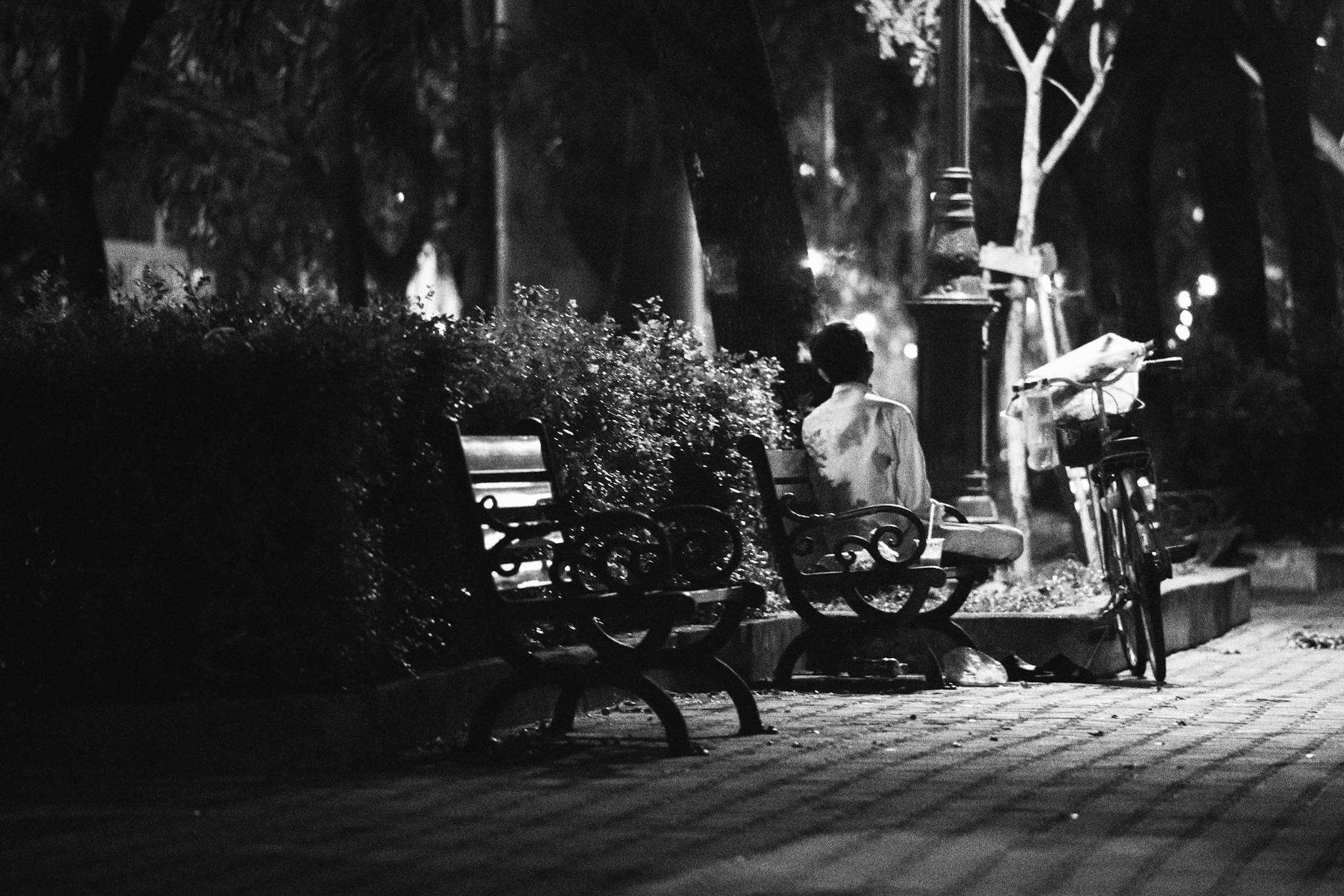 person alone bench city
