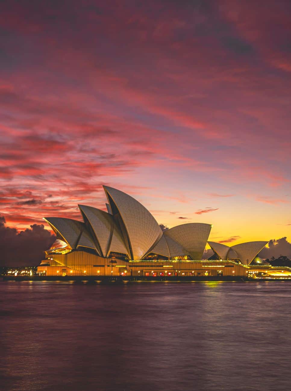 sydney opera house at sunset with vibrant skies