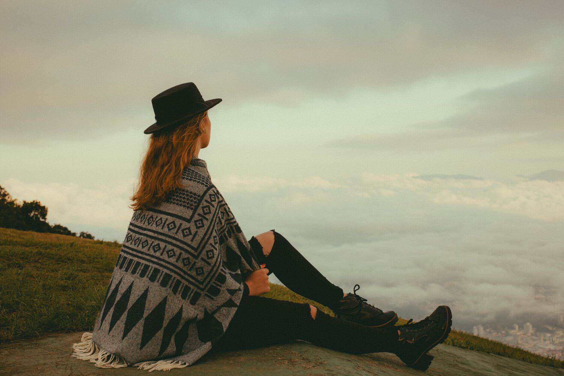traveler sitting doing nothing – photo by Bruna Fossile on Pexels