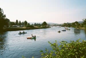 Bend Oregon downtown with Deschutes River and mountains