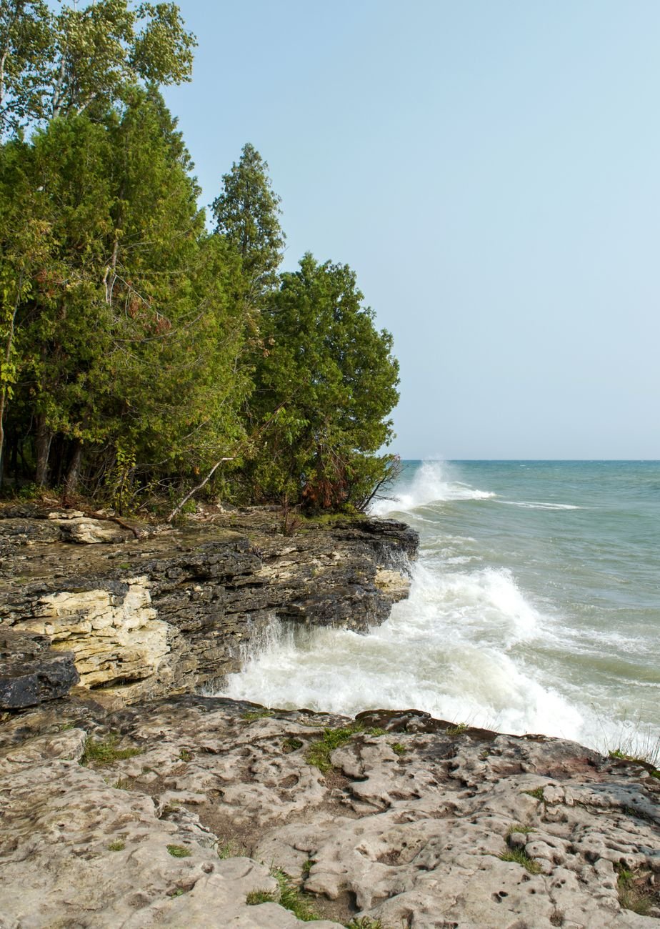 Door County Wisconsin lighthouse and Lake Michigan shoreline