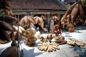Crowded tourist shopping street with souvenir stands