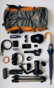 Essential travel gear and accessories laid out for packing
