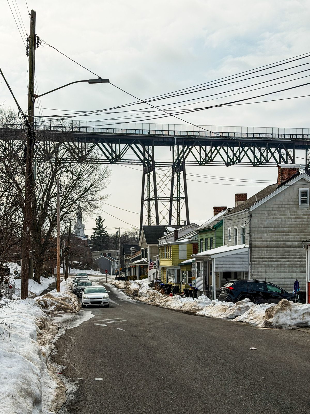 Historic main street in a Hudson Valley New York town with mountains in background