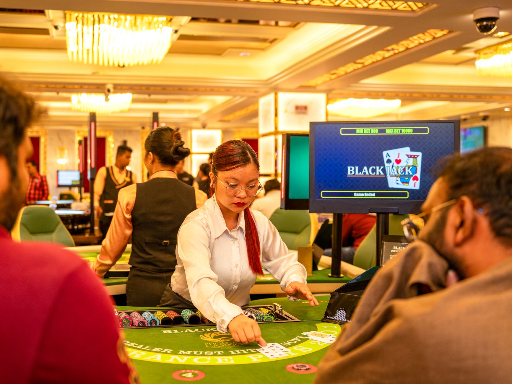 Casino resort interior with elaborate lighting and no visible clocks