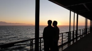 Cruise ship deck sunset passengers