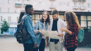 Friends discussing trip expectations before departure