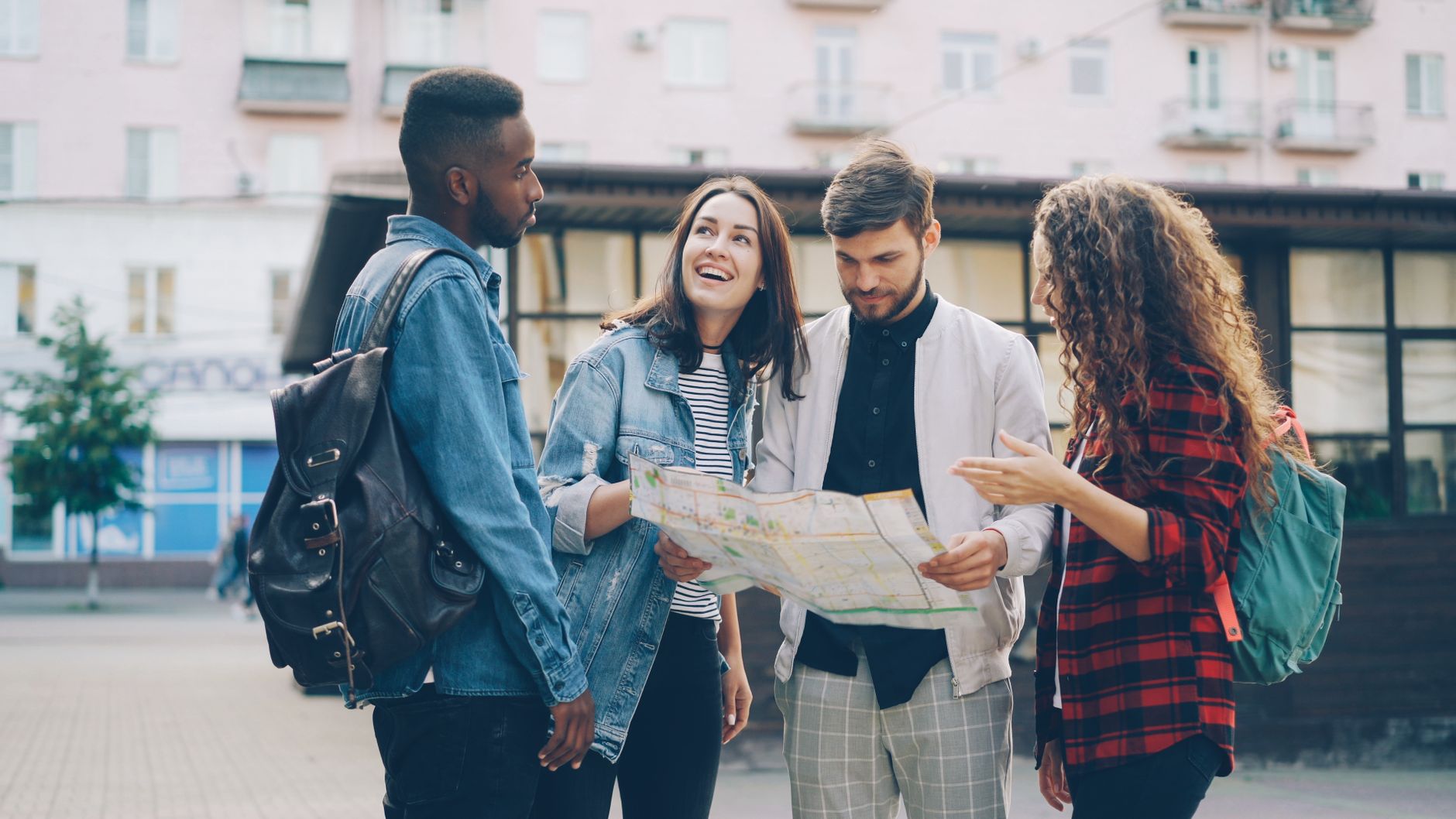 Friends discussing trip expectations before departure