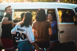 Friends talking through a disagreement while traveling together