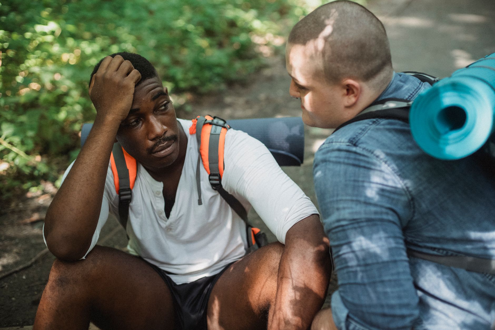 Friends disagreeing during a hike