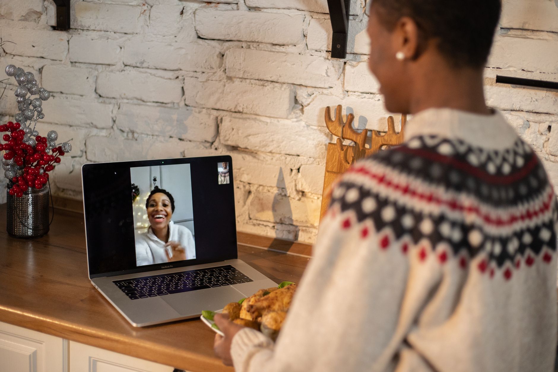 Friends video calling to plan a trip
