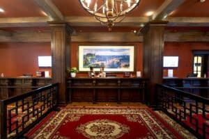 Guest checking in at a hotel front desk