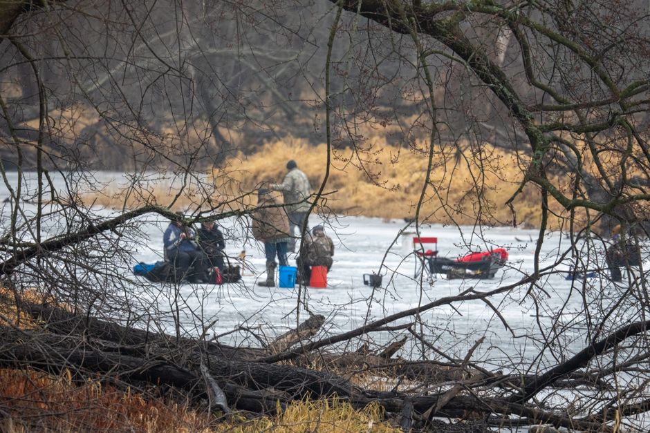 Ice fishing houses on frozen Midwest lake