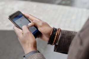 Smartphone showing a geotagged location pin on a map