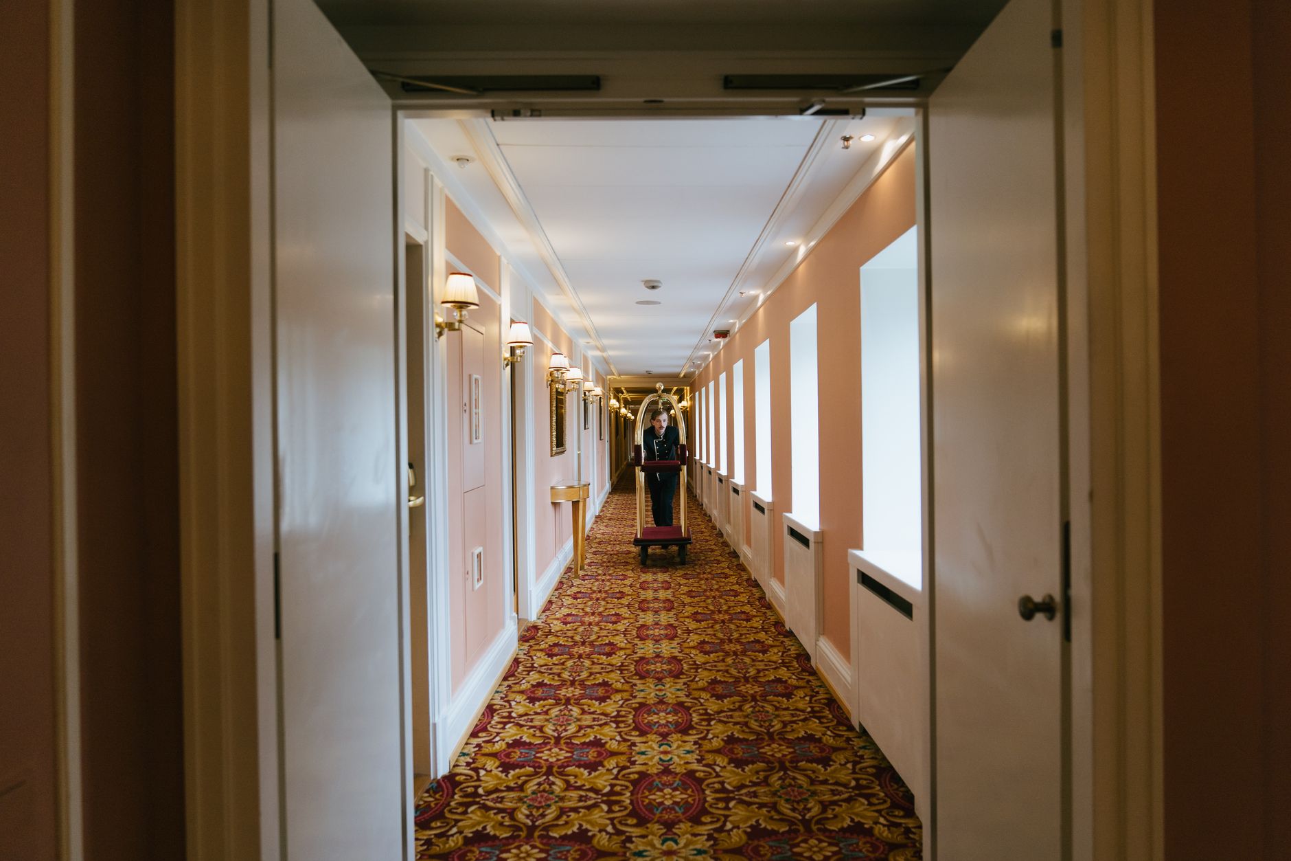 Interior resort hallway with no exterior windows
