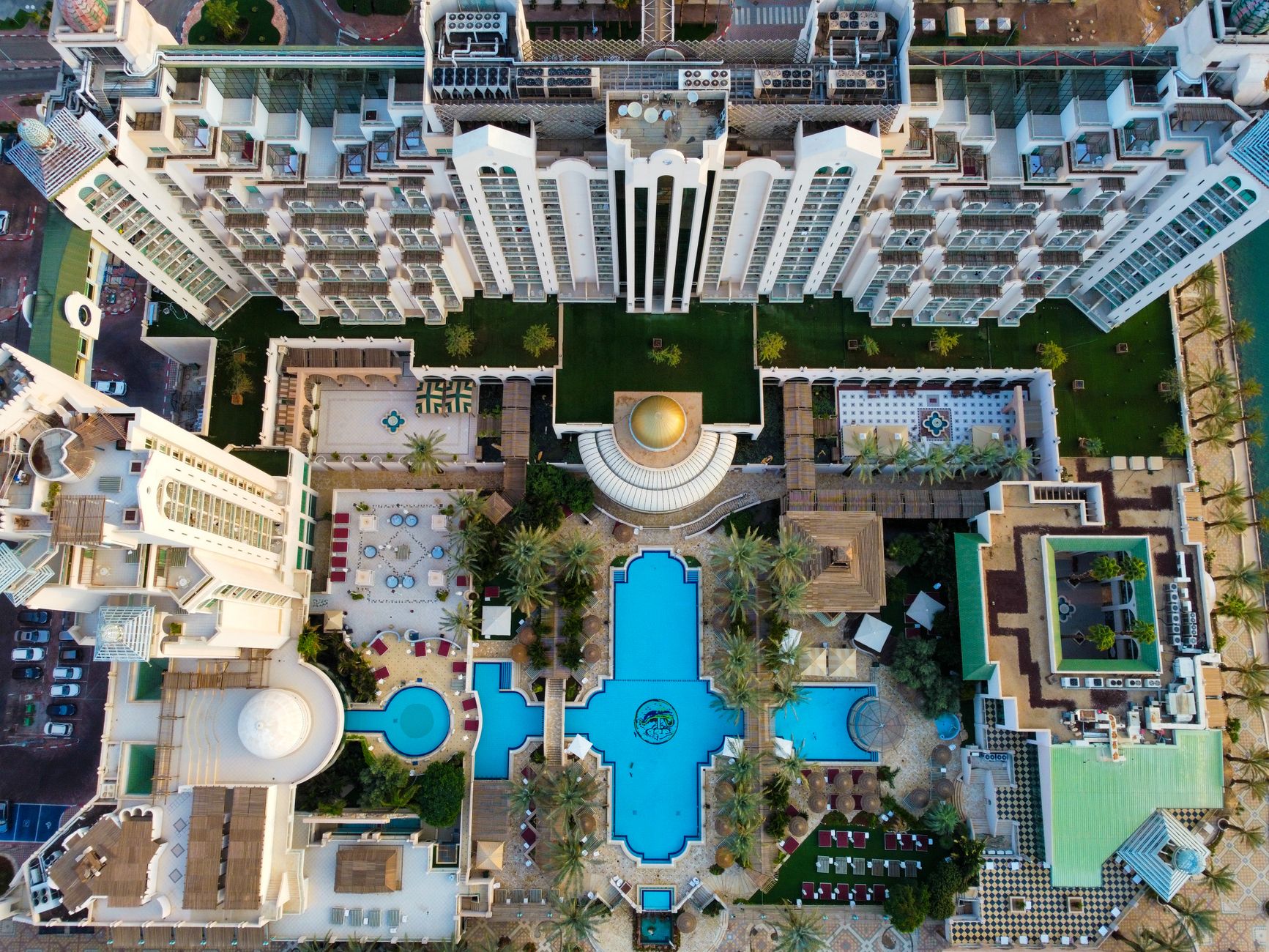 Aerial view of sprawling resort pool complex