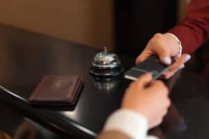 Travel agent discussing luxury hotel booking with a client