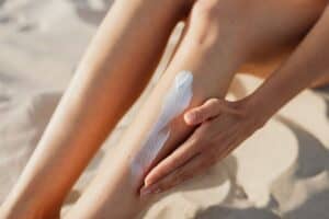 Traveler sunscreen application beach