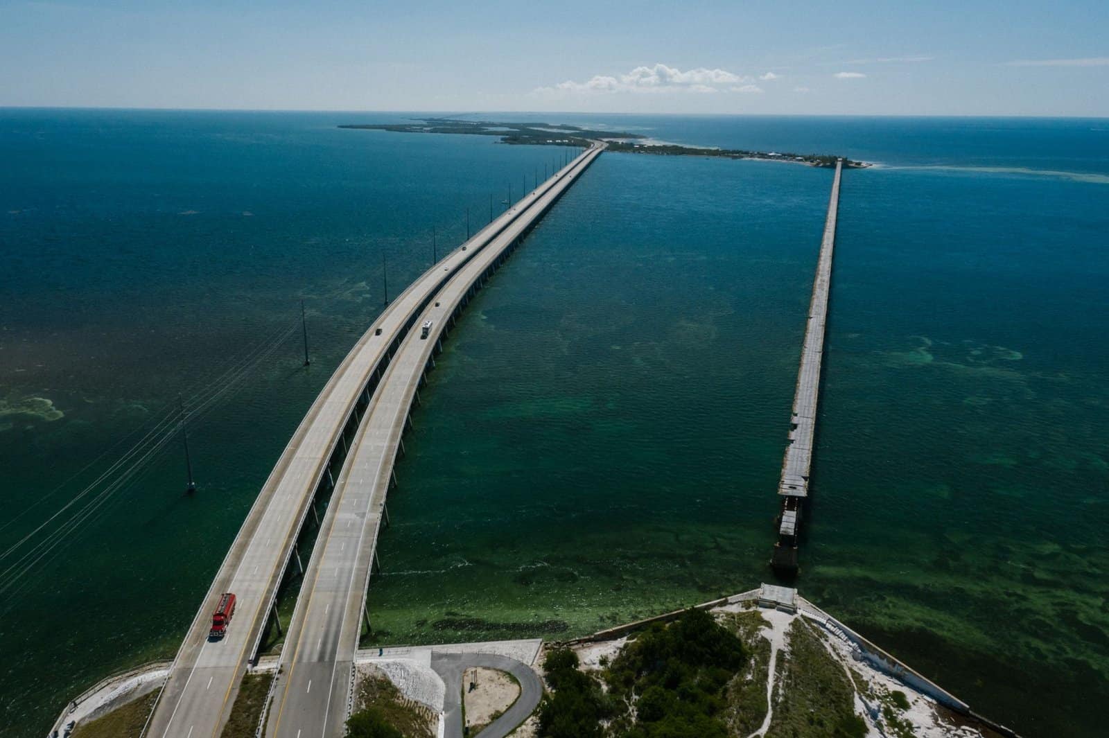 Aerial view of the iconic Seven Mile Bridge stretching over the clear blue waters of the Florida Keys.