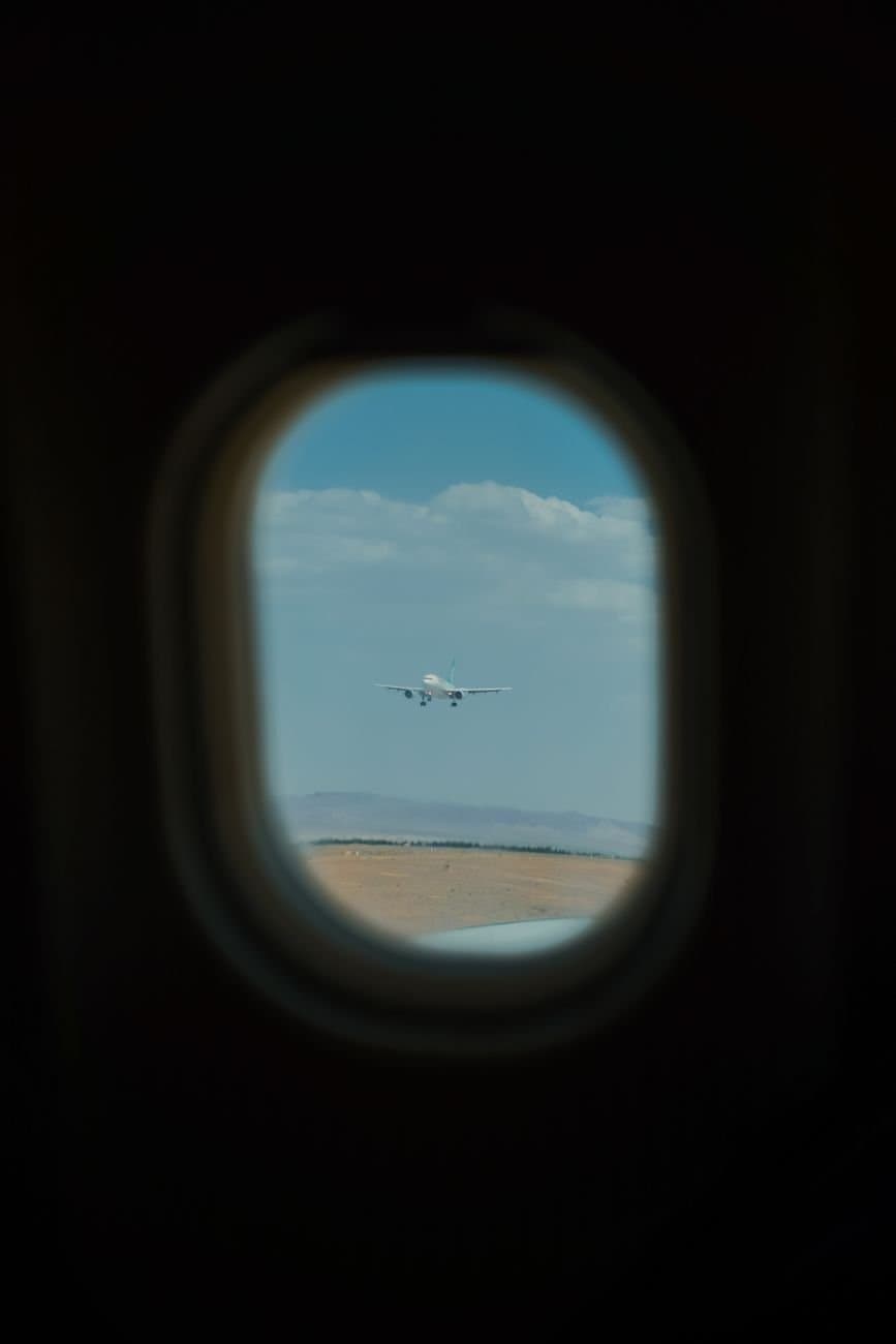 The Red-Eye Flight Saves You a Hotel Night and Costs You Your Entire First Day. Here’s When It’s Worth It and When It’s Not