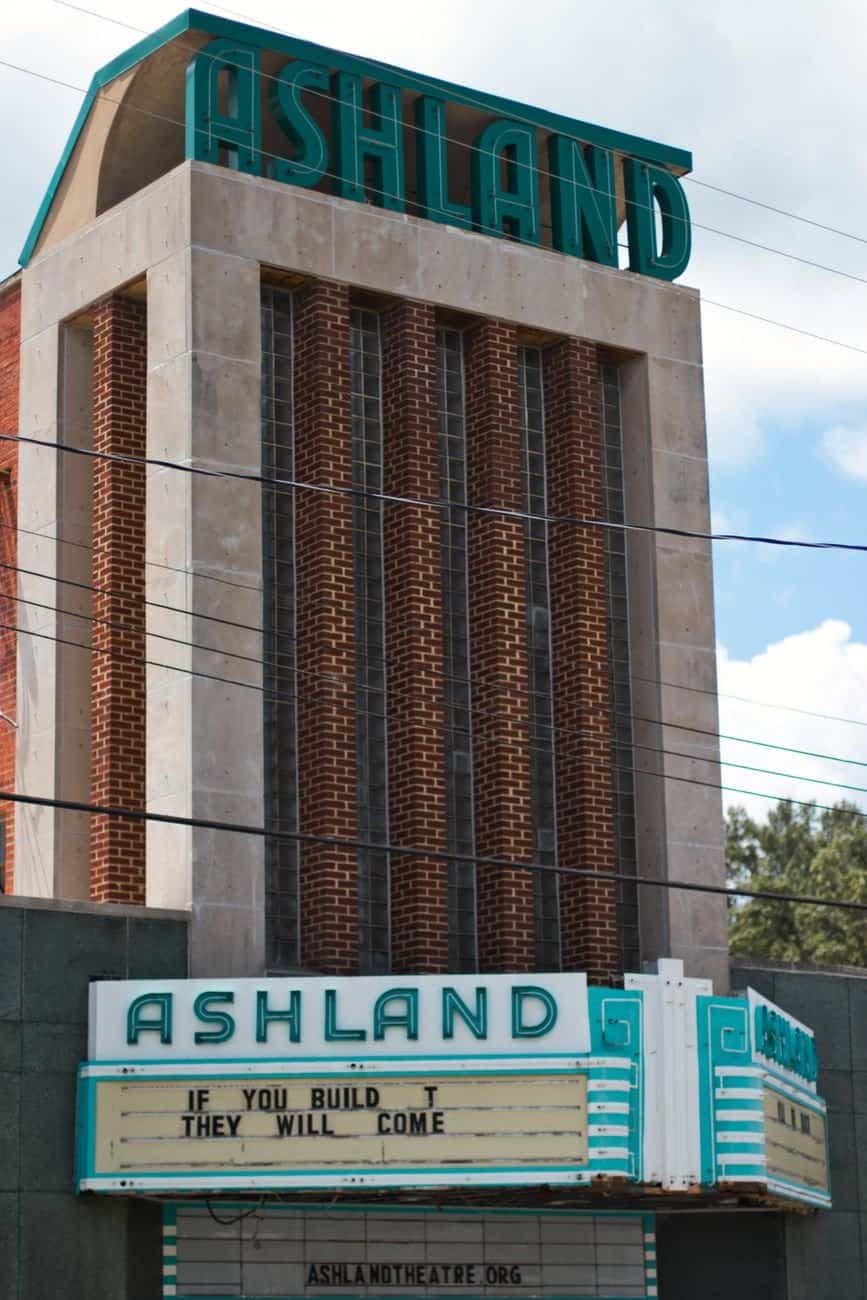 Historic Ashland Theatre with Art Deco architecture and vibrant signage.