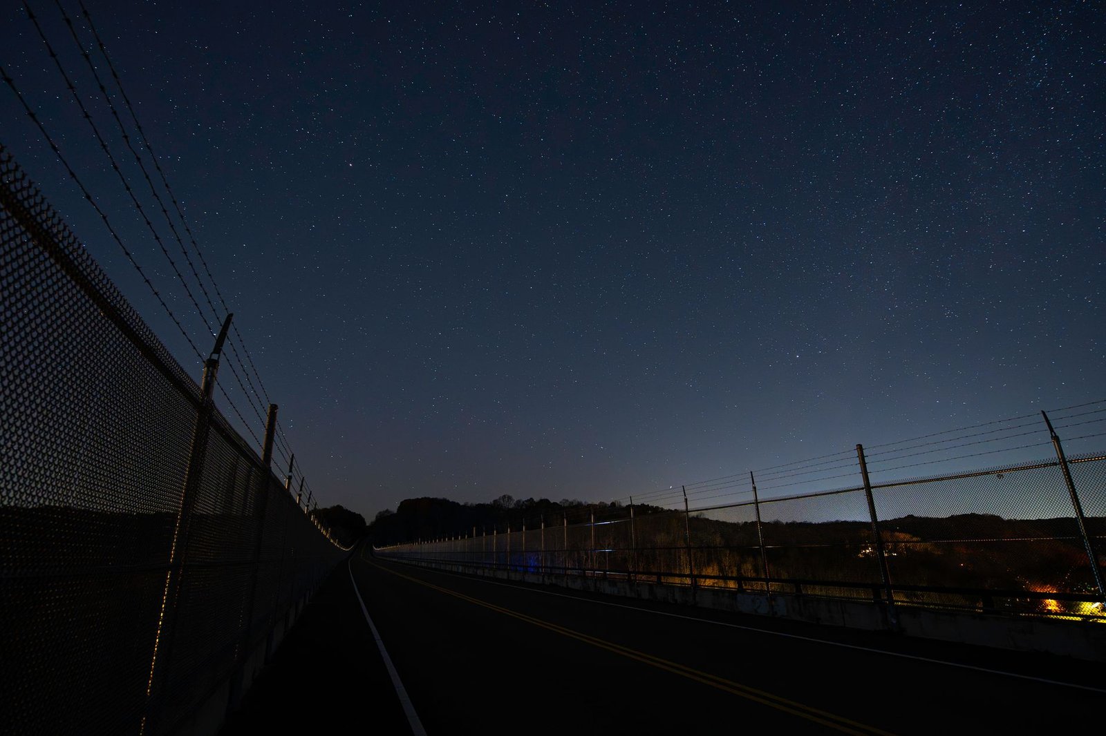 A starry night sky view over the Natchez Trace Bridge in Nashville, Tennessee.